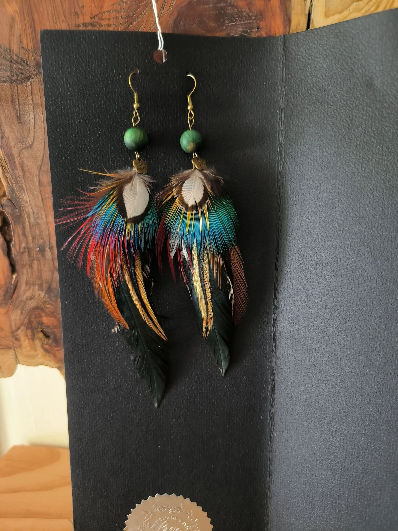 Boucles d'oreilles bohème chic longues originales en plumes naturelles 